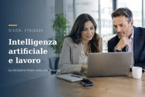 Due professionisti davanti a un laptop in ufficio: nuove regole su intelligenza artificiale e lavoro, D.Lgs. 179/2026